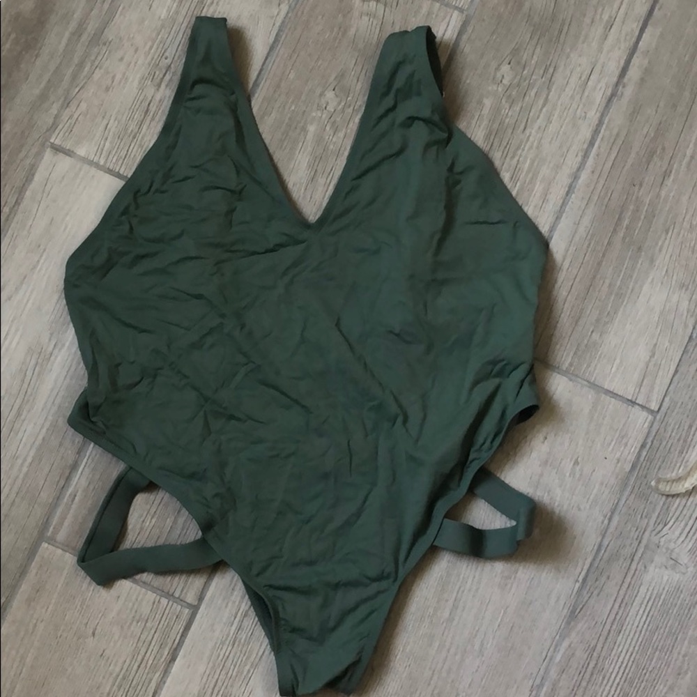 Green plus size one piece with cut outs